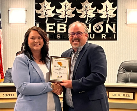Image of Mayor Jared Carr and Gold Leaf Award recipient Emily Huckaby